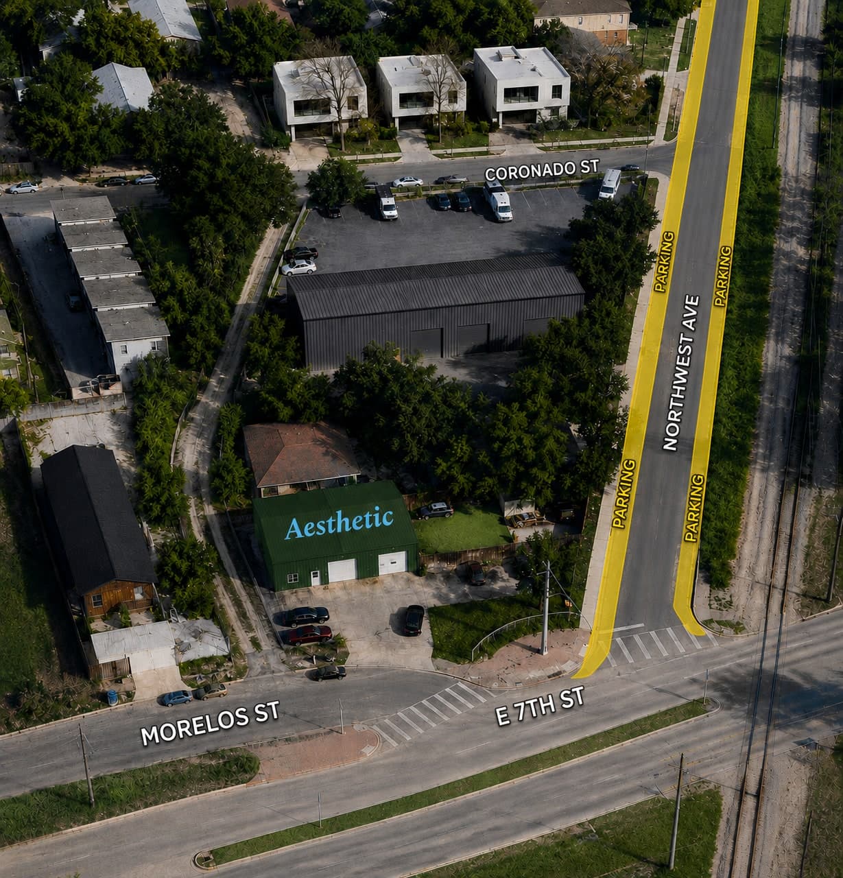 Aerial map. Aesthetic's green building is on Morelos Street, just off East 7th Street. Parking is marked along both sides of Northwestern Avenue (labelled Northwest Ave in the image), which runs north from East 7th Street to Coronado Street.